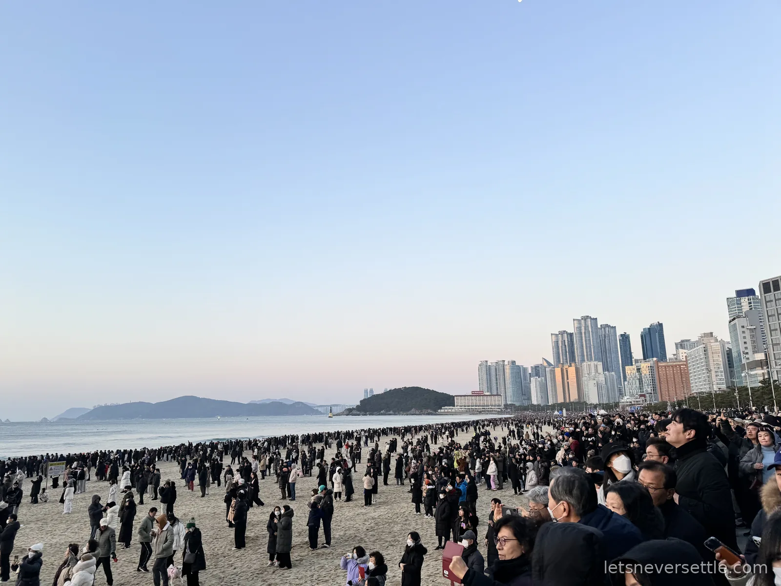 Thousands of people gathered on Haeundae beach at dawn waiting for the first sunrise of the new year