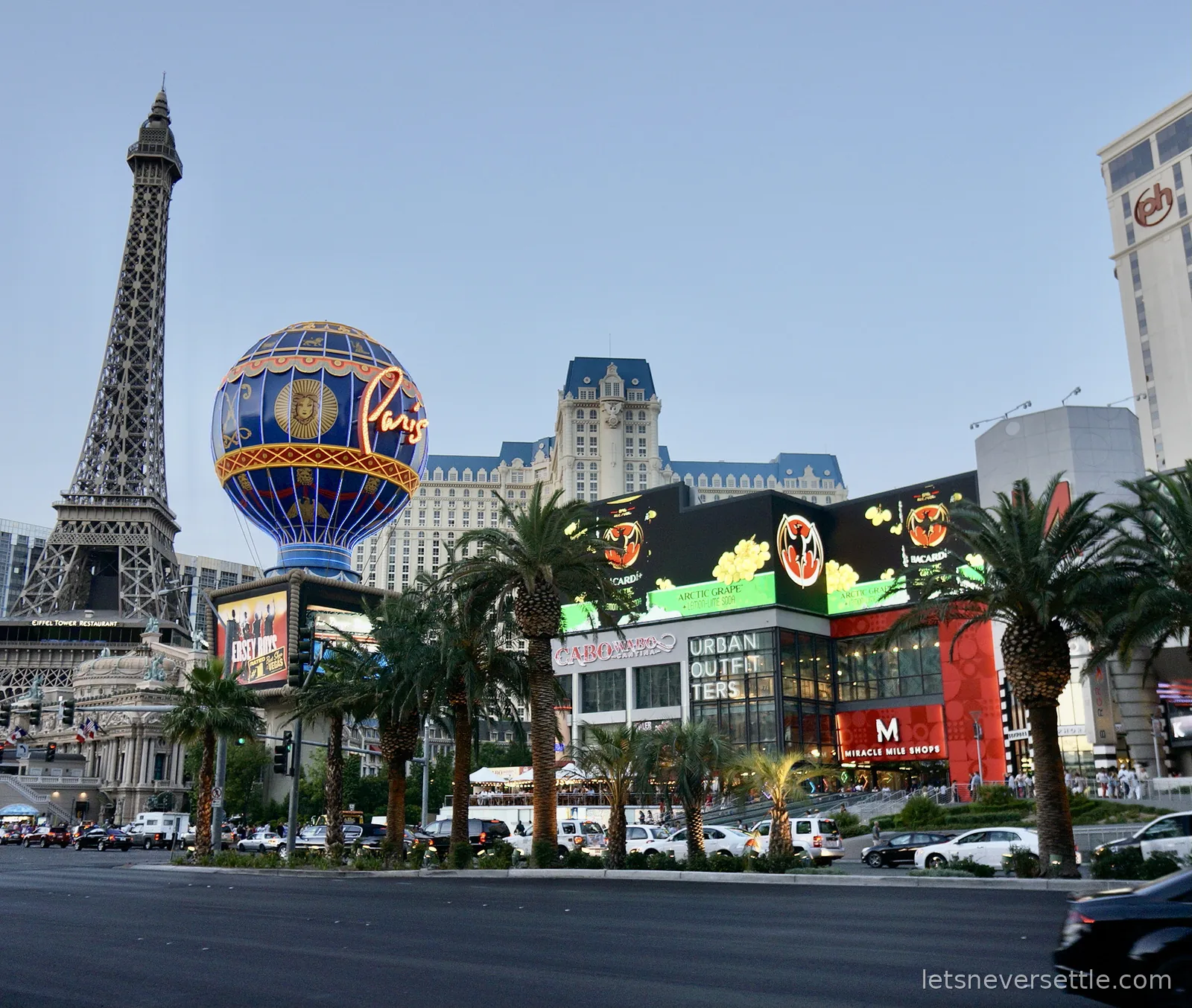 The half-scale Eiffel Tower and Montgolfier balloon sign of Paris Las Vegas at dusk