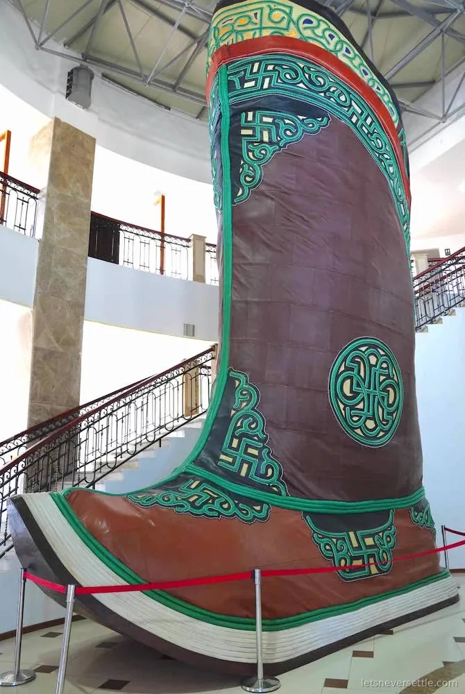 An enormous traditional Mongolian boot displayed inside the base of the Chinggis Khaan statue complex